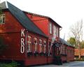 Den Gamle Kro, Gram